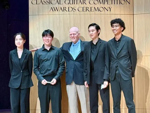 Justin Chen at a classical guitar competition awards ceremony