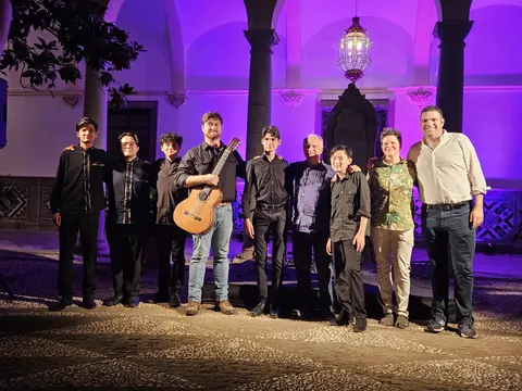 Justin Chen with musicians at the Granada Guitar Festival