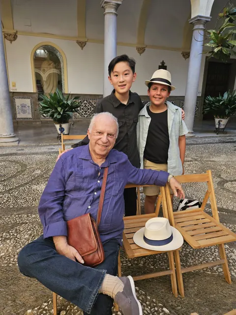 Justin Chen with musicians in Granada, Spain