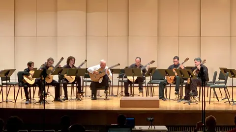 Justin Chen performing in a guitar ensemble