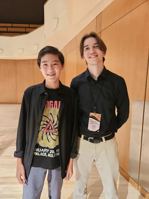 Justin Chen with a fellow musician at the Guitar Foundation of America