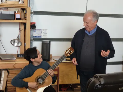 Justin Chen playing for a mentor