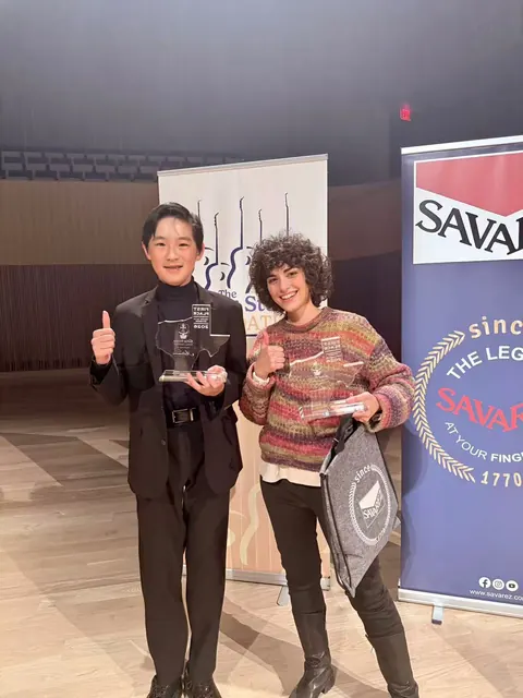 Justin Chen with a fellow guitarist at The Guitar Studio International Festival in Dallas