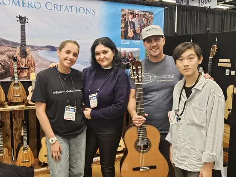 Justin Chen at the Romero Creations booth at The NAMM Show