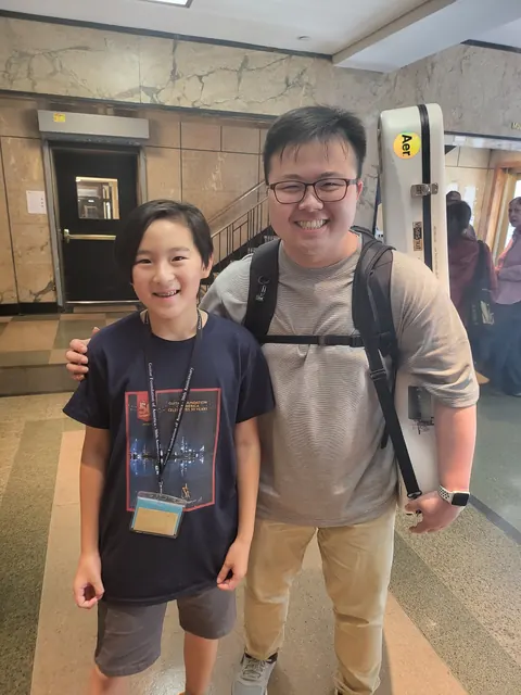 Justin Chen with a fellow guitarist
