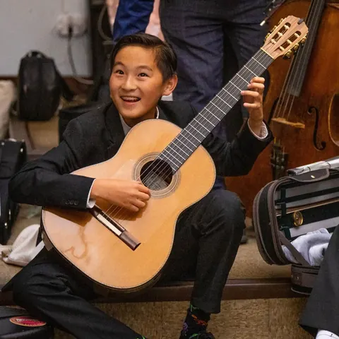 Justin Chen with his classical guitar