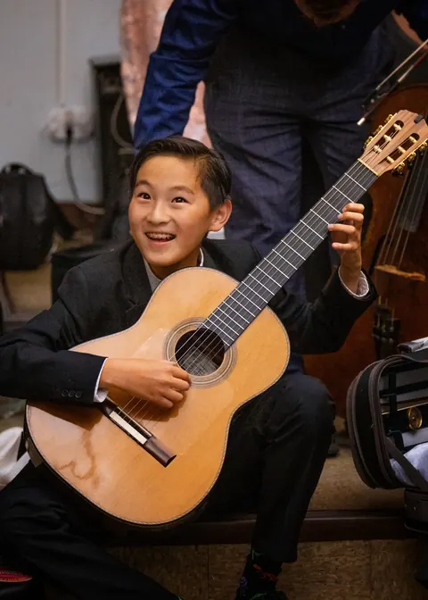 Justin Chen with his classical guitar