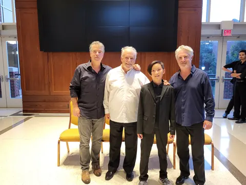 Justin Chen with musicians