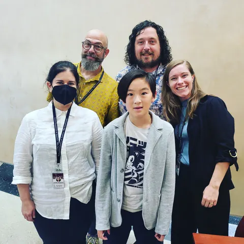 Justin Chen with musicians
